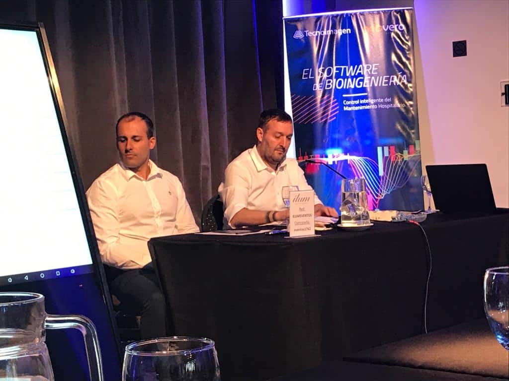 ignácio marola e emilio moscardo em evento da neovero sistemas na argentina